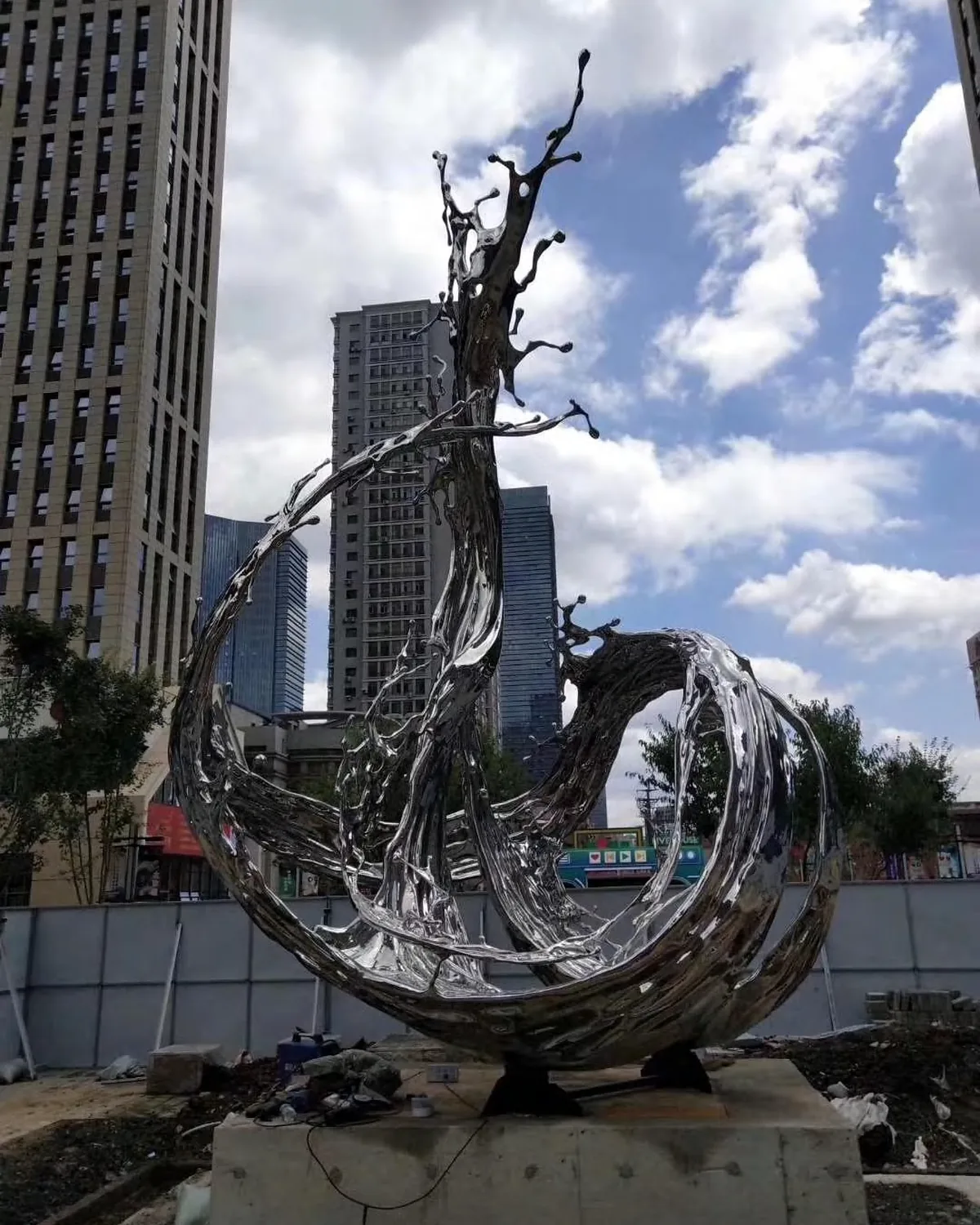 Polished stainless steel sculpture surface and fabrication detail